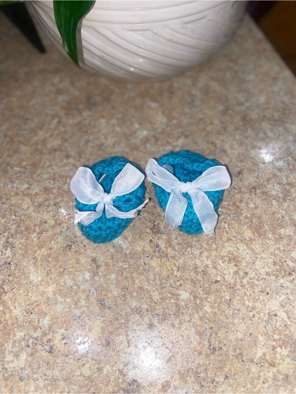 Crocheted Turquoise Baby Booties with a White Ribbon Bow Accent - Picture 3 of 4
